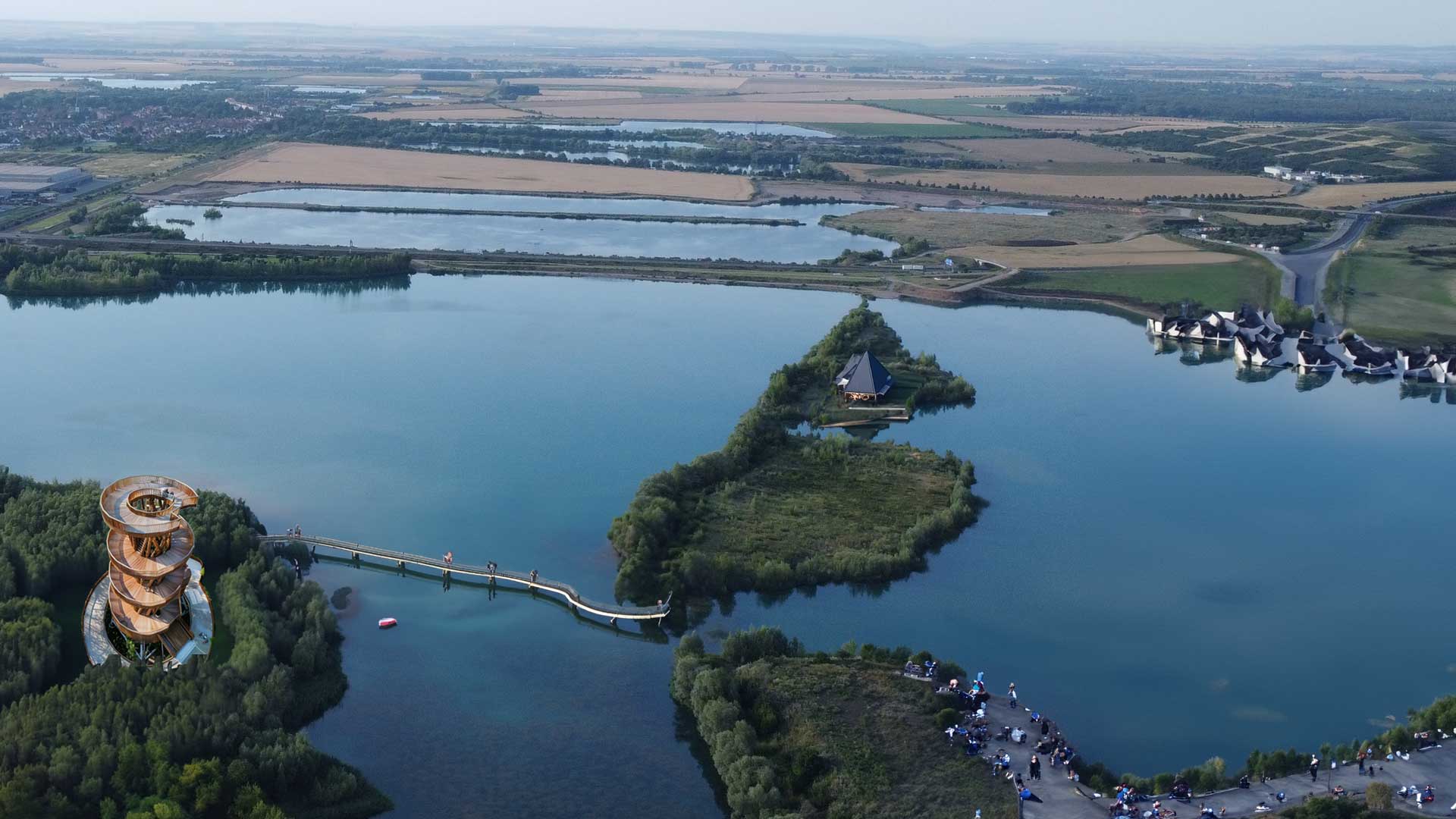 Der Sulzer See in einer KI generierten Fotomontage mit Aussichtsturm, Badestrand und Gourmetinsel.